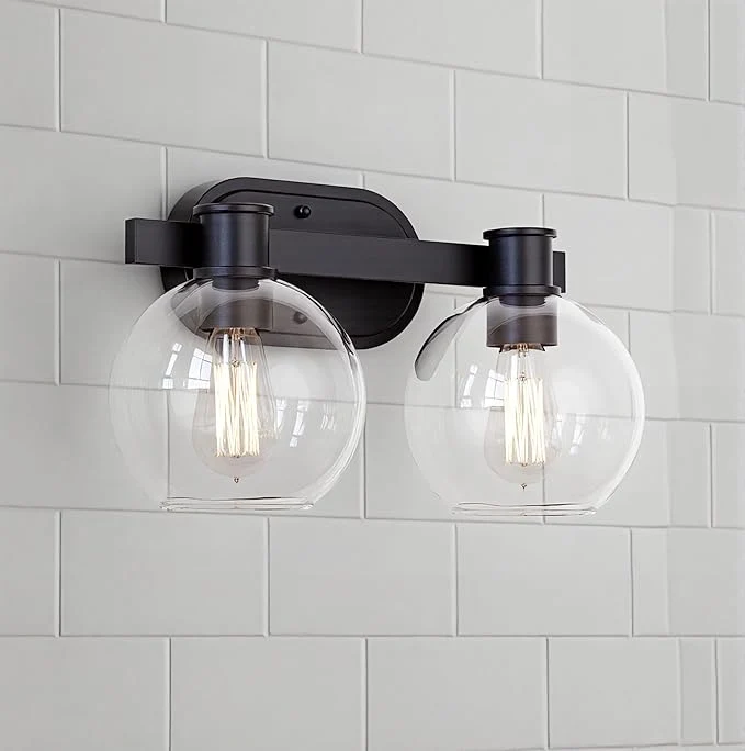 Smooth Dan Modern Farmhouse 2-Light Vanity Light Wall Sconce Lighting with Clear Glass Globe Shade in Light Black Finish for Bedroom Hallway KitchenAbout ThisOverview Consistent
